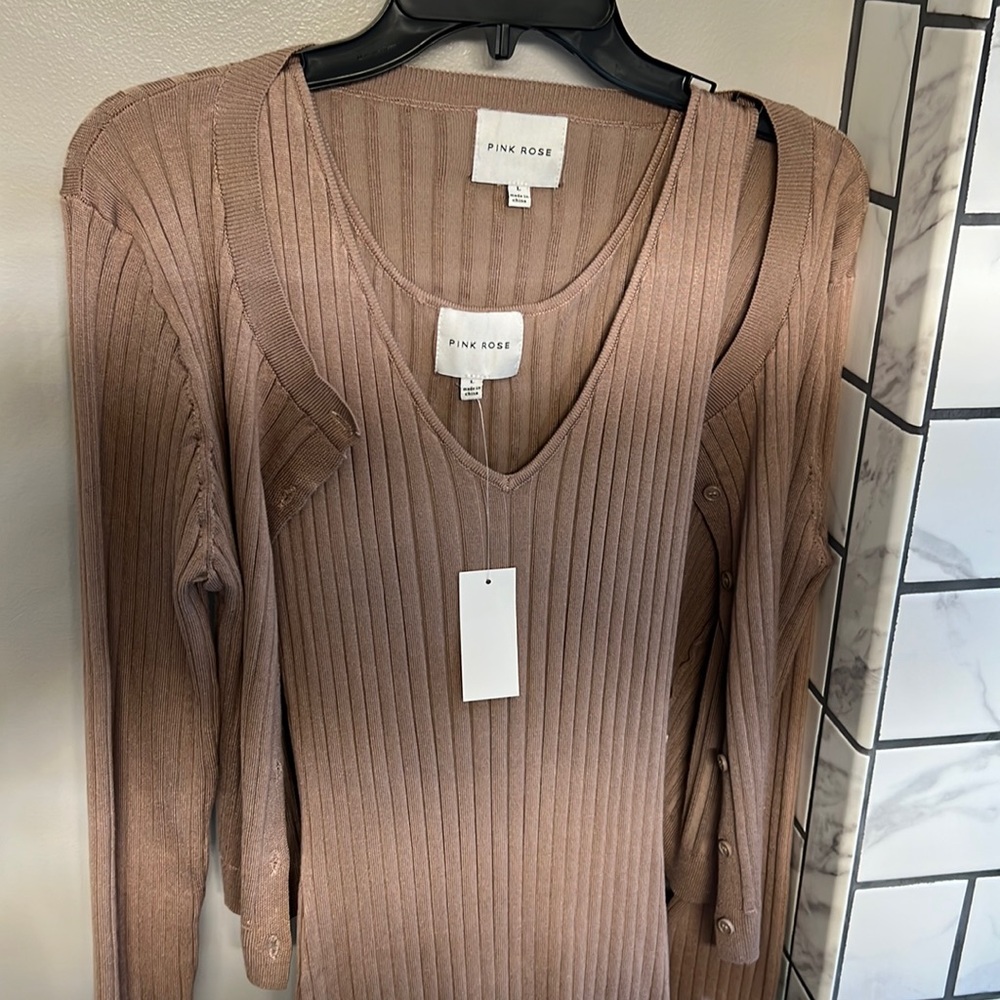 Brand new. With tags. 2 set piece Long dress with cardigan